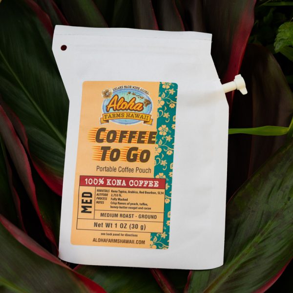 Aloha Farms Coffee to Go pouch sitting in a tree